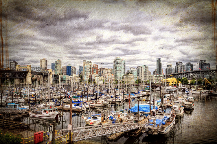 View from False Creek to downtown Vancouver including the Burrard Street Bridge and Cambie Bridge. Read the story behind the image and find out how it was made today on the blog: http://annemckinnell.com/2013/06/25/an-overcast-day-in-vancouver-bc/