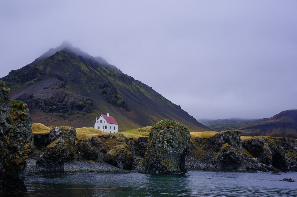 White House in Arnarstapi Harbor, Iceland by Ann McKinnell